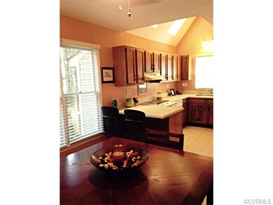 The kitchen offers a great gathering area with spa