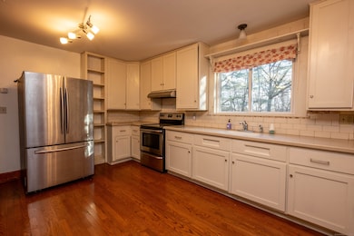 Kitchen with window offering views of your beautiful backyard.