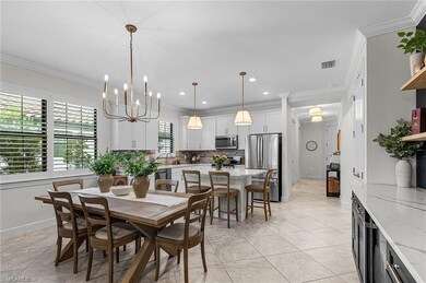 Dining space featuring ornamental molding, light tile patterned flooring, a chandelier, wine cooler, and recessed lighting