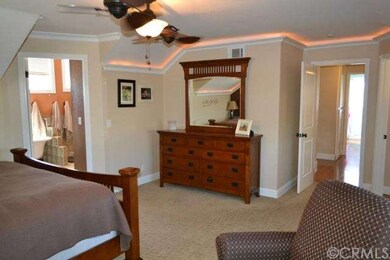 Master suite with back lit crown moldings 
