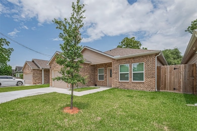 This photo features a charming, single-story home