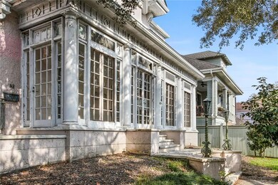 View of sunroom french doors, transom windows, col