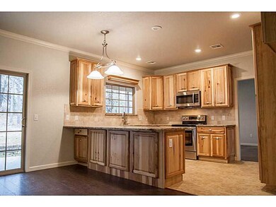 Kitchen. Beautiful cabinets and flooring are just two of the features you ll love in this spacious kitchen!