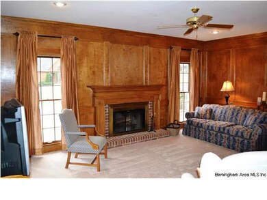 Beautiful den with amazing oak-paneled walls, wood