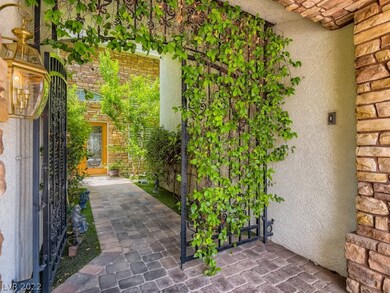 Gated Entry to Courtyard and House
