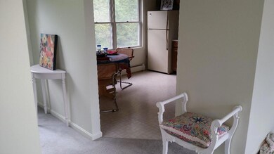 Front hall into kitchen, ample...