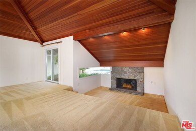 Vaulted ceilings with beautiful wood detail and su