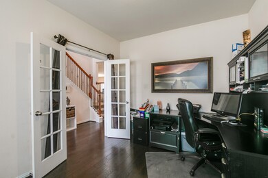 Double French doors provide privacy as you work and study.