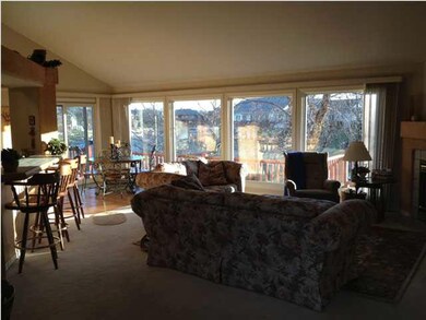 Open & airy, with 15' vaulted great room and floor