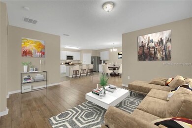 *Virtually Staged* Open concept design with hard f