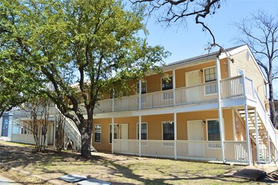 View of property featuring stairway