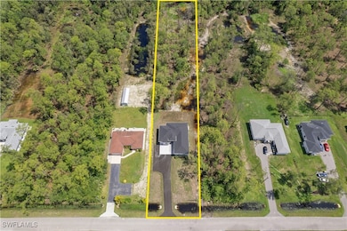 Aerial perspective of suburban area with property