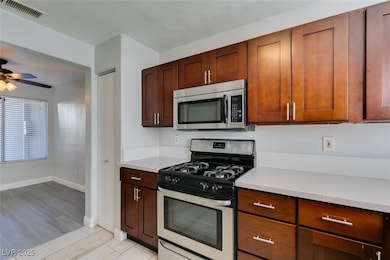 The kitchen has been renovated and has tile floori