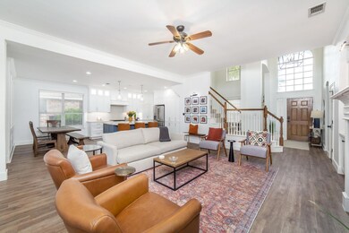 Living room with hardwood / wood-style floors, cro