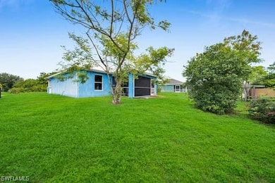 711 Downer Ave S unit 1, Lehigh Acres, FL 33974 - photo 3