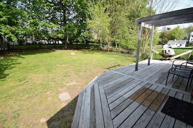 Sliders from Family Room open onto a Large Ground 