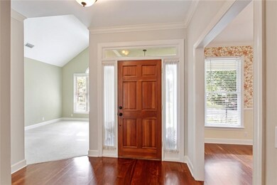 Freshly painted foyer invites you in to take a clo