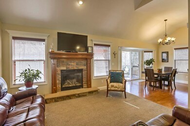 Living room w/ stunning stone gas FP
