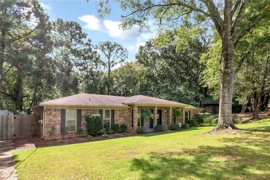 View of front of house featuring a front lawn