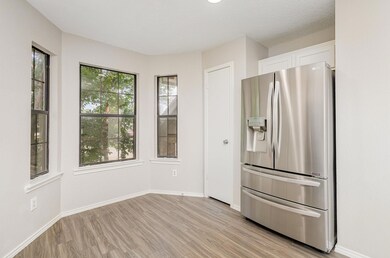 View of front property with a garage, central AC, 