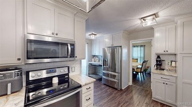Coffee bar to right and crockpot island to left of