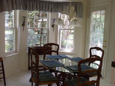 Dining Area with Beautiful Bay Windows and French 