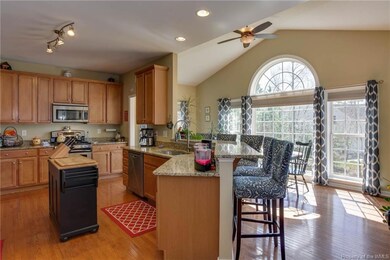 Kitchen with granite ctps, SS appliances and gas c