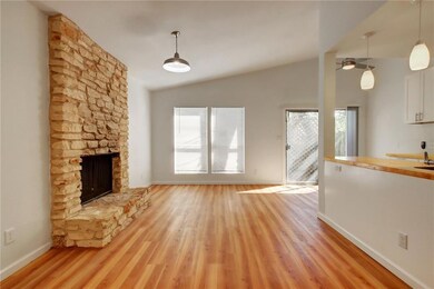 Unfurnished living room with light wood-style flo