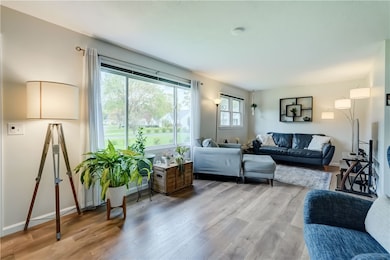 Plenty of space in the bright & airy living room!