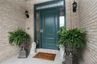 Greet your guests at the covered entry...