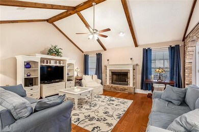 Freshly painted living room with wood flooring, ca