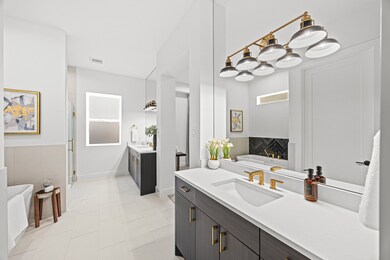 This bathroom features a modern design with sleek