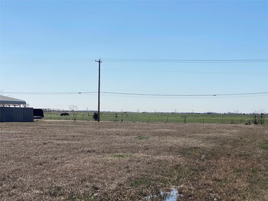 View of yard with a rural view