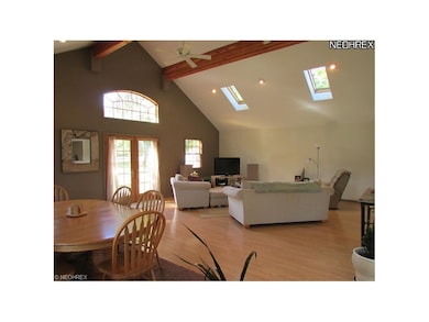 Skylights and Two Ceiling Fans w/Laminate Floor