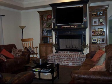 Living Room. BEAUTIFUL FIREPLACE WITH BRICK AND BO