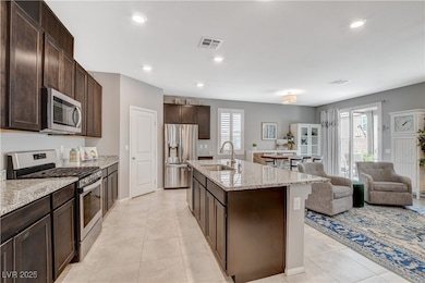 Kitchen featuring a sink, plenty of natural light,