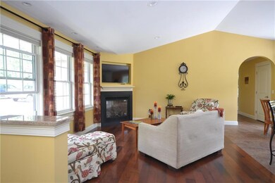 Living room features gas fireplace...