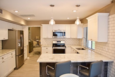 Granite counter tops and backsplash