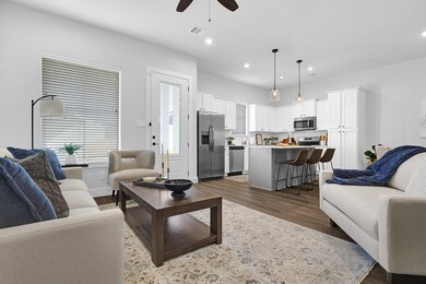 WELCOME TO THE THREE BEDROOM! SOARING 10 FOOT CEILINGS, WOOD LAMINITE FLOORING (TWO OPTIONS- GREY OR BROWN), STAINLESS STEAL APPLIANCES AND SO MUCH MORE!
