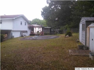 Flat Fenced Yard with 2 Storage Sheds