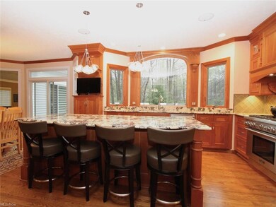 Large island with seating for 4, lovely views thro