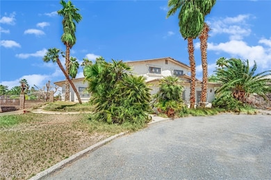 View of front of property with stucco siding and f