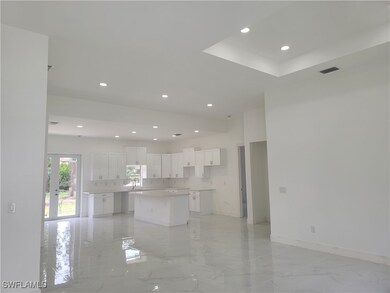 Unfurnished living room featuring recessed lightin