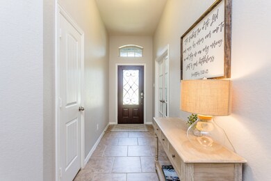 The artistry begins at the entry where architectural details abound starting with the Charleston Cherry wood, glass & iron front door (which includes a Schlage front door key pad deal bolt/lock controlled by touching the numbers or by using your phone app).