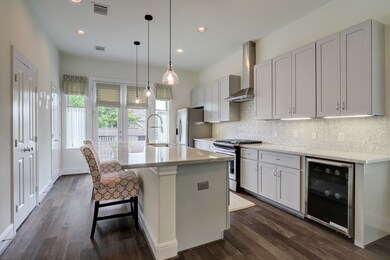 The kitchen boasts marble counter tops, beautifull