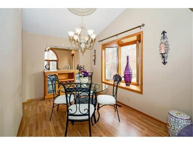 Dining room has wonderful bay window and flows int