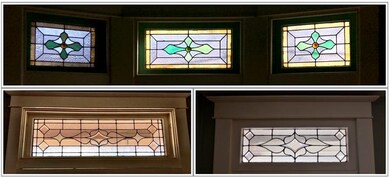 There are two leaded glass windows in the living r