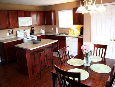 Breakfast Area/Room. More natural light from the kitchen sink area.