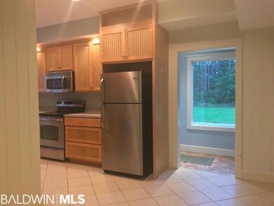 Large picture window brings the outdoors in.