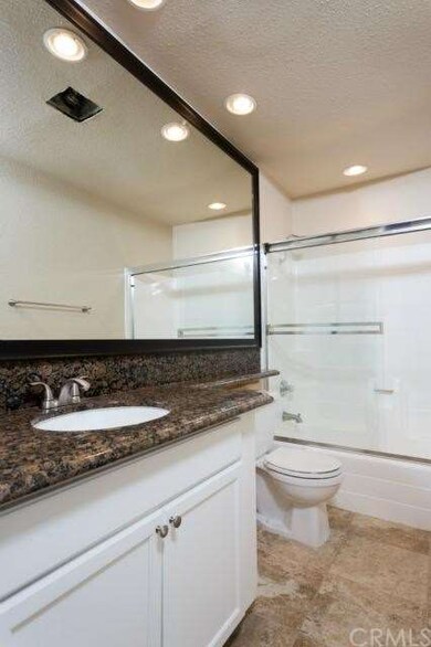 Granite Bath with Ceramic Flooring!